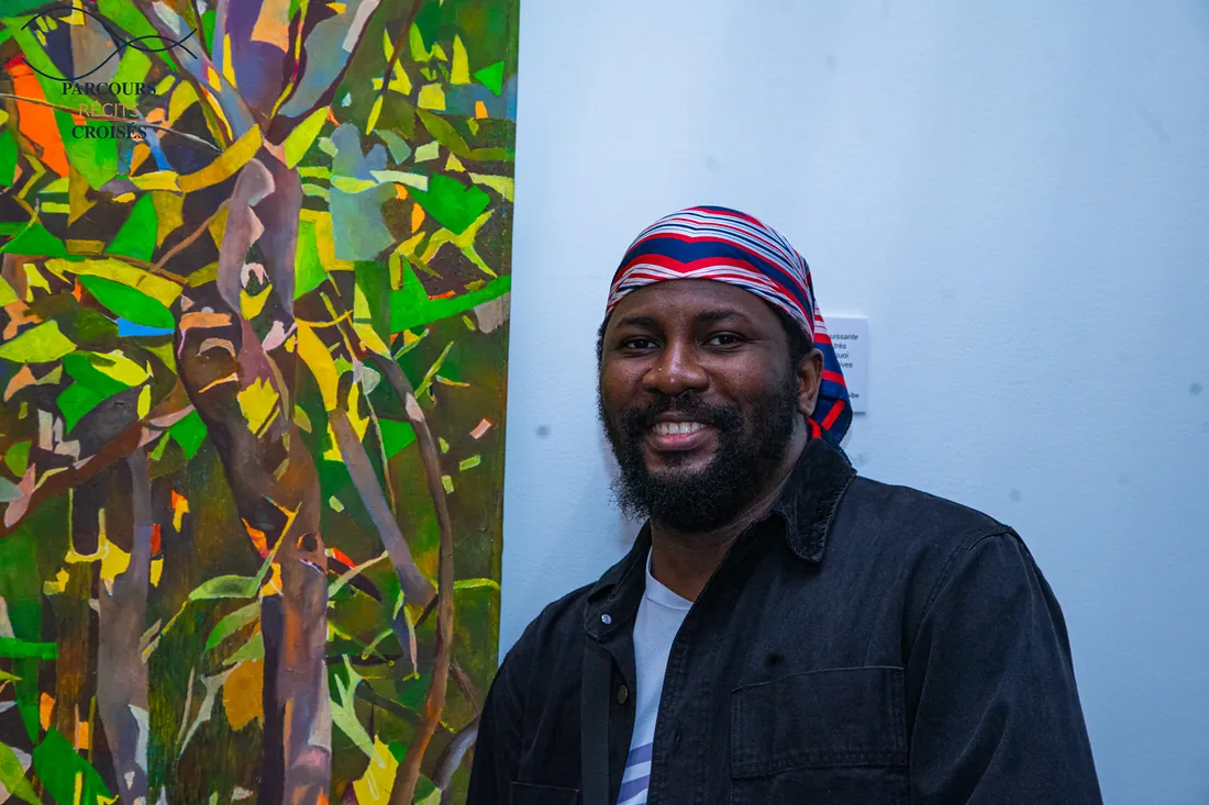 A smile in front of the canvas